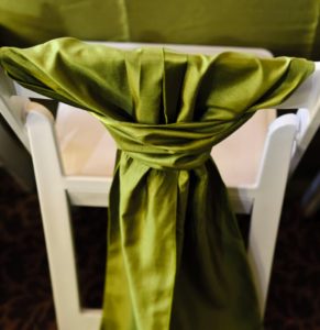 Green Sash on White Chair