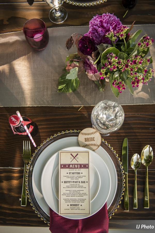 Wedding Guest Table with gold and white dishes and glassware