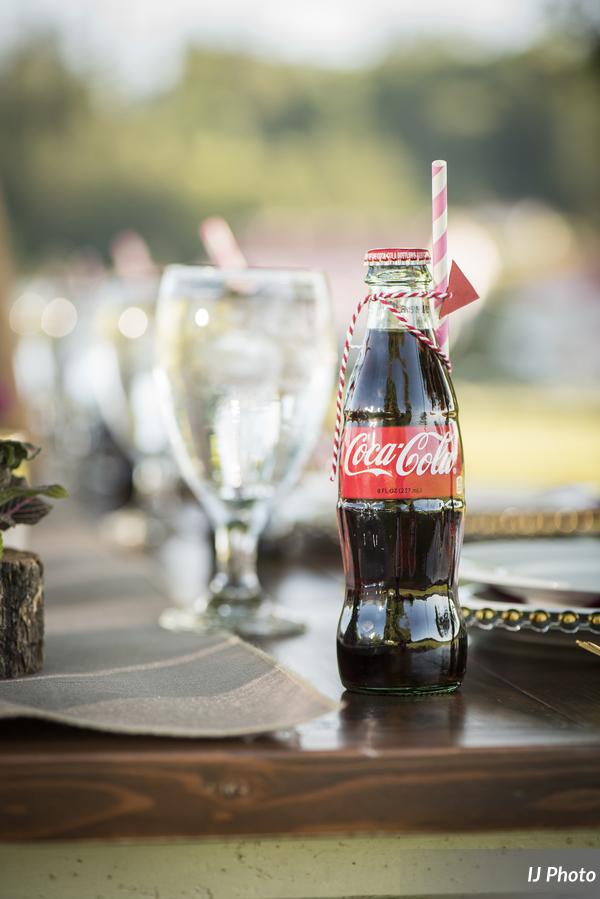 Old Fashion coke bottle on a wood table