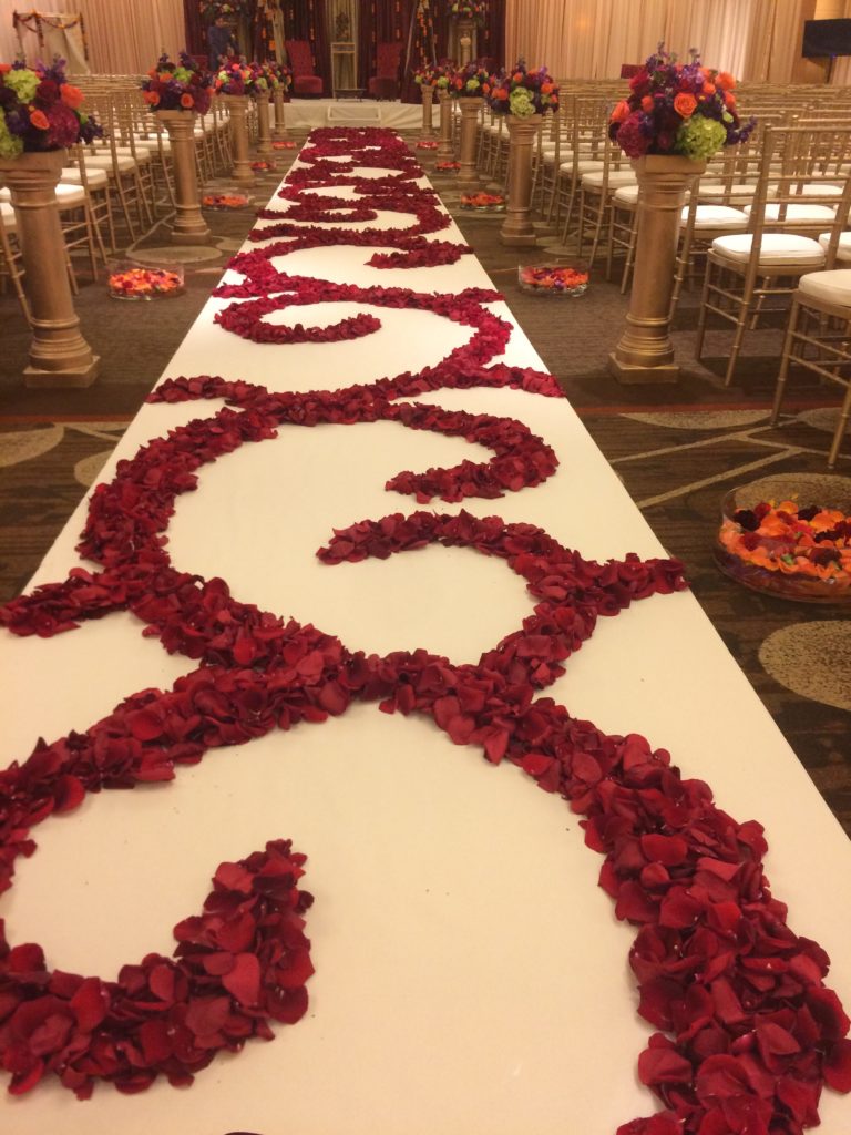 Seattle Floral Designer Flowers by Shamay Red Rose Petal Design down the aisle