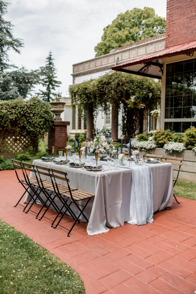 Wedding Reception Table in courtyard of Lairmont Manor